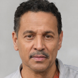 Neutral white adult male with short  black hair and brown eyes