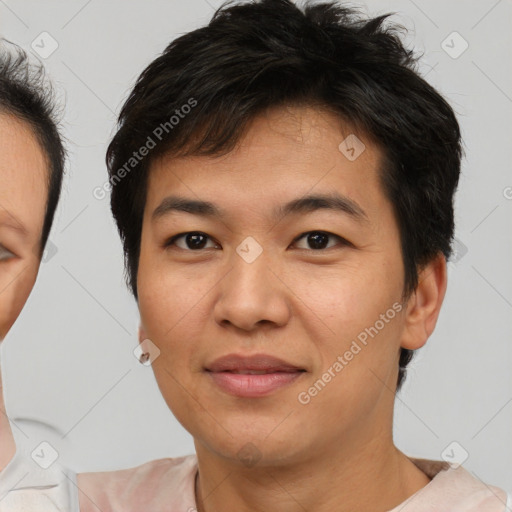 Joyful asian young-adult male with short  brown hair and brown eyes