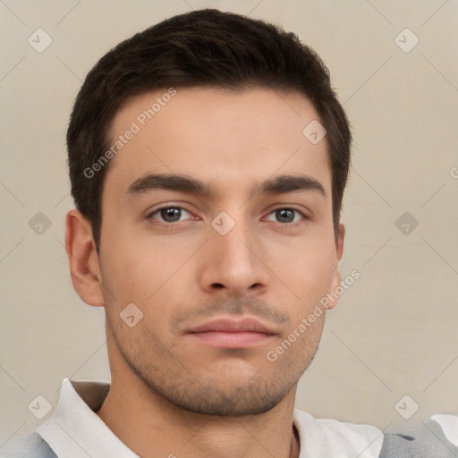 Neutral white young-adult male with short  brown hair and brown eyes