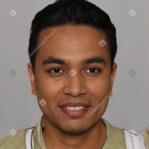 Joyful latino young-adult male with short  black hair and brown eyes