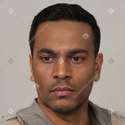Neutral latino young-adult male with short  black hair and brown eyes