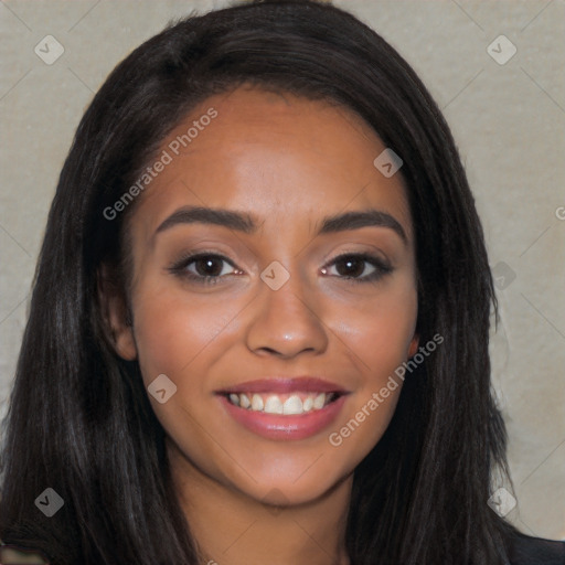 Joyful latino young-adult female with long  brown hair and brown eyes