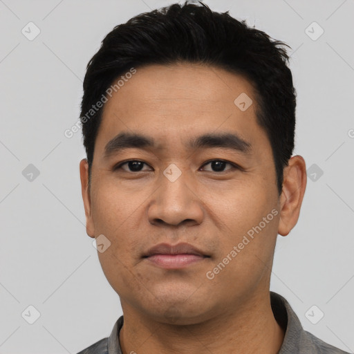 Neutral asian young-adult male with short  black hair and brown eyes