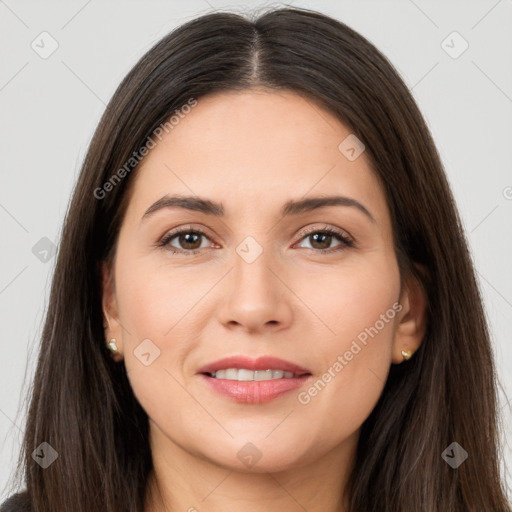 Joyful white young-adult female with long  brown hair and brown eyes