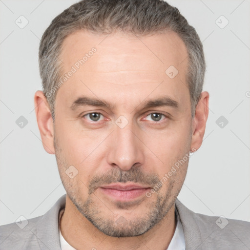 Neutral white adult male with short  brown hair and brown eyes