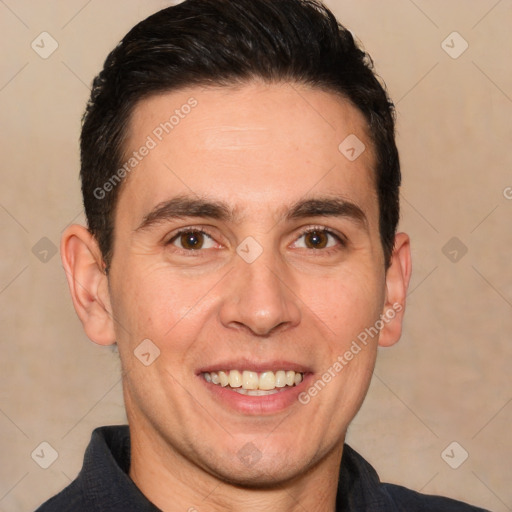 Joyful white adult male with short  brown hair and brown eyes