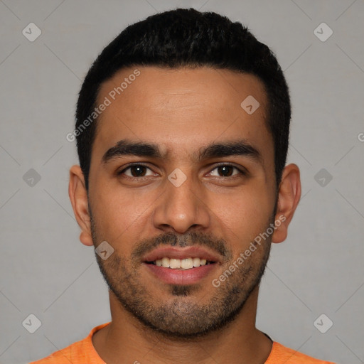 Joyful latino young-adult male with short  black hair and brown eyes