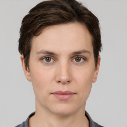 Neutral white young-adult female with short  brown hair and brown eyes