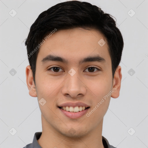 Joyful white young-adult male with short  black hair and brown eyes