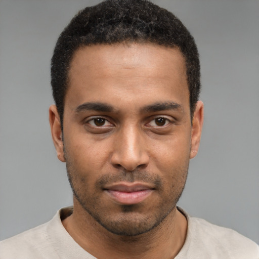 Neutral black young-adult male with short  brown hair and brown eyes