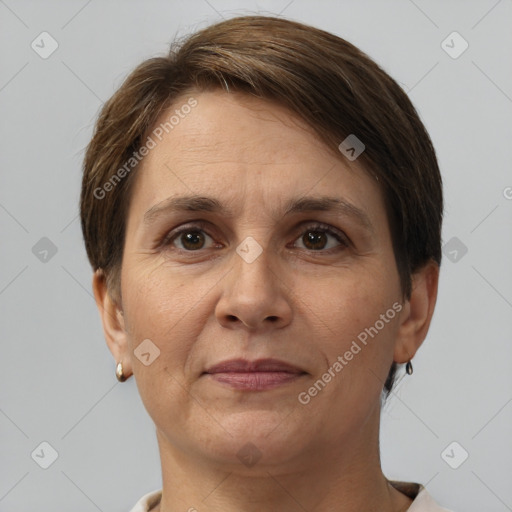 Joyful white adult female with short  brown hair and brown eyes