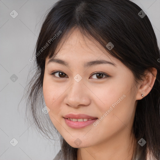 Joyful white young-adult female with medium  brown hair and brown eyes