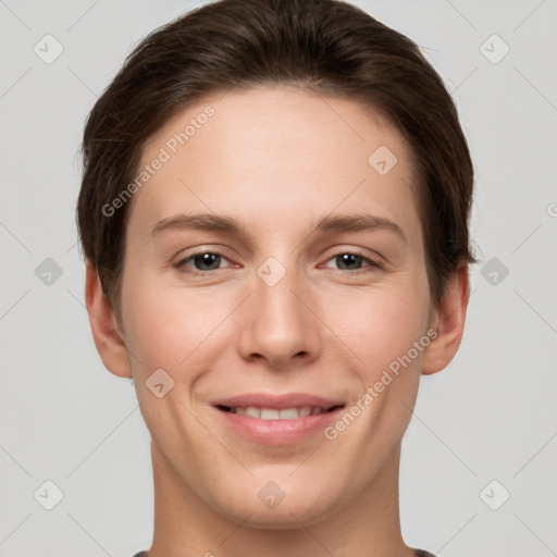 Joyful white young-adult female with short  brown hair and brown eyes