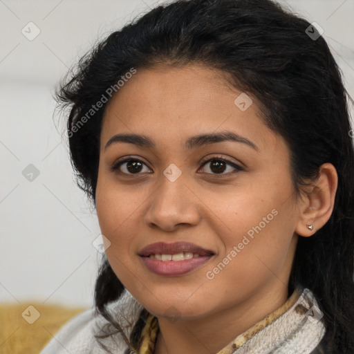 Joyful latino young-adult female with medium  brown hair and brown eyes