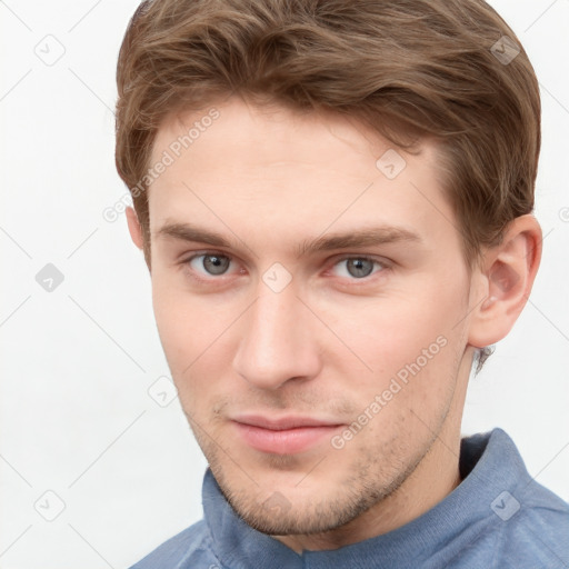 Neutral white young-adult male with short  brown hair and grey eyes