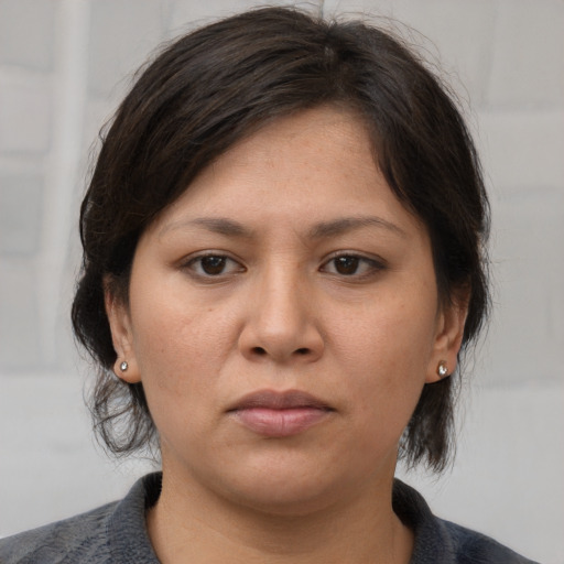 Neutral asian young-adult female with medium  brown hair and brown eyes