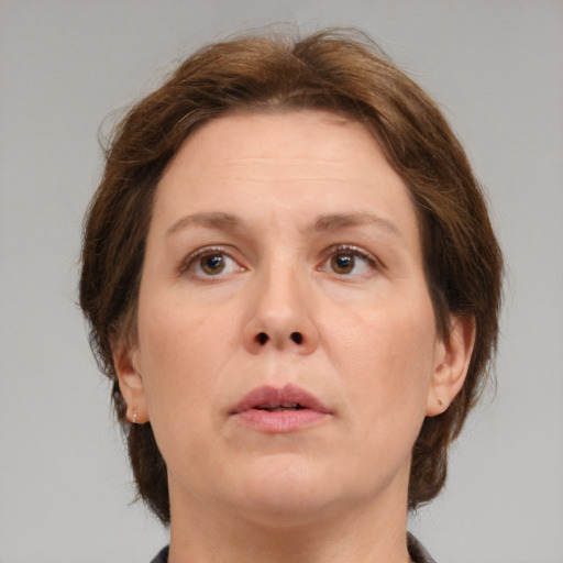 Neutral white adult female with medium  brown hair and brown eyes