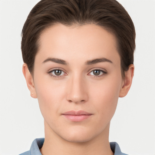 Neutral white young-adult female with short  brown hair and brown eyes