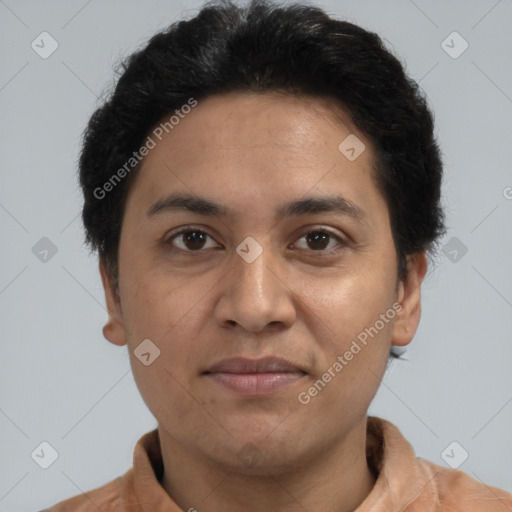 Joyful latino young-adult male with short  brown hair and brown eyes