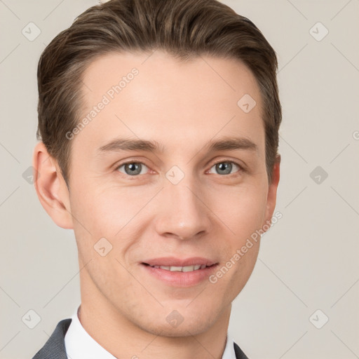 Joyful white young-adult male with short  brown hair and grey eyes