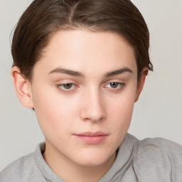 Neutral white young-adult female with short  brown hair and brown eyes