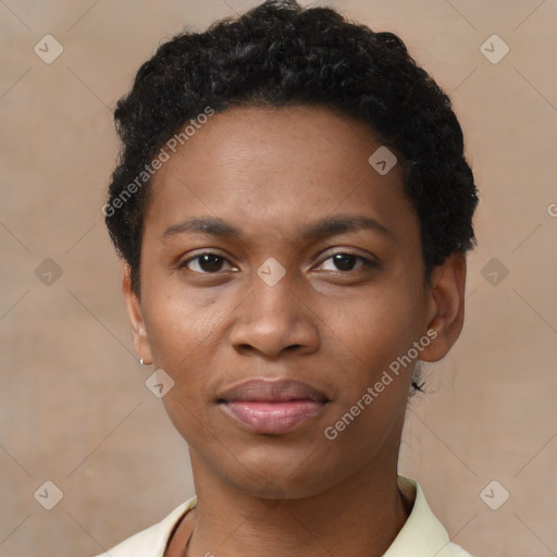 Joyful black young-adult female with short  black hair and brown eyes