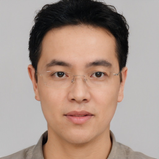 Neutral asian young-adult male with short  brown hair and brown eyes