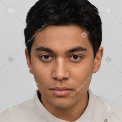 Neutral latino young-adult male with short  black hair and brown eyes