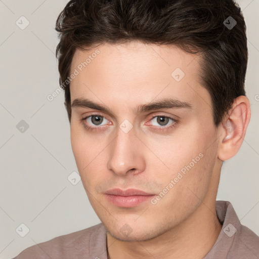 Neutral white young-adult male with short  brown hair and brown eyes