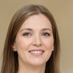 Joyful white young-adult female with long  brown hair and grey eyes