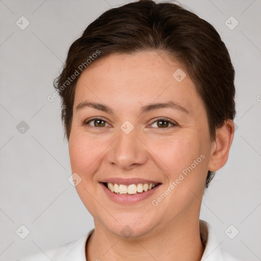 Joyful white young-adult female with short  brown hair and brown eyes