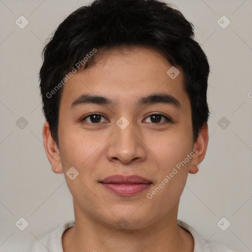 Joyful asian young-adult male with short  brown hair and brown eyes