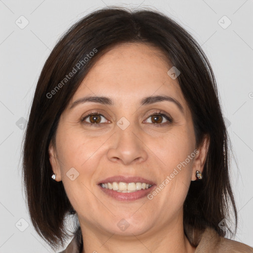 Joyful white adult female with medium  brown hair and brown eyes