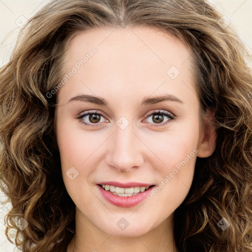 Joyful white young-adult female with long  brown hair and green eyes