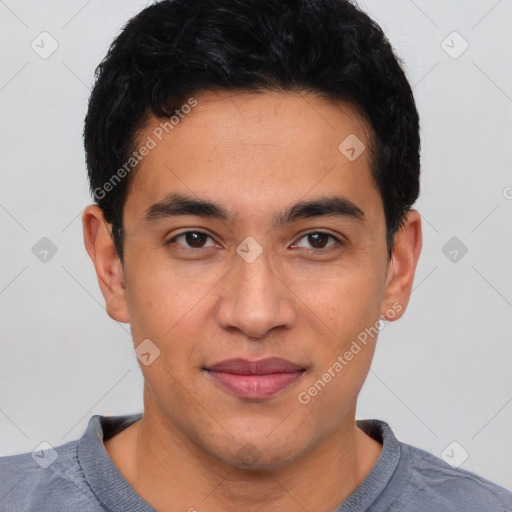 Joyful latino young-adult male with short  brown hair and brown eyes