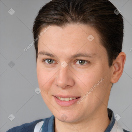 Joyful white adult male with short  brown hair and brown eyes