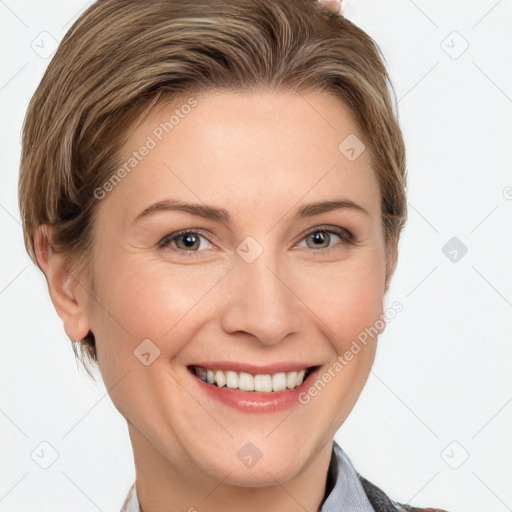 Joyful white young-adult female with short  brown hair and grey eyes