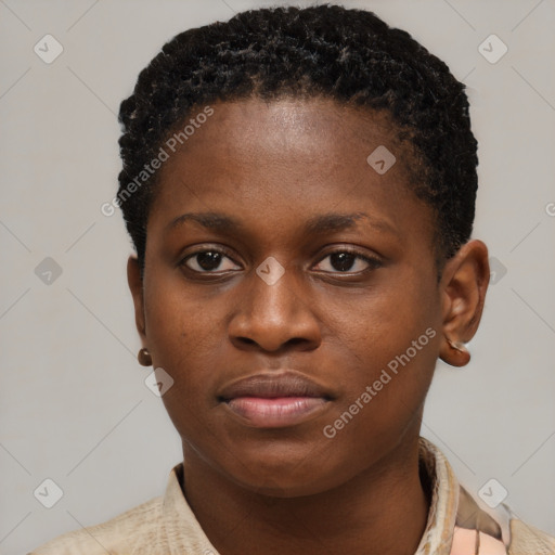 Joyful black young-adult female with short  brown hair and brown eyes