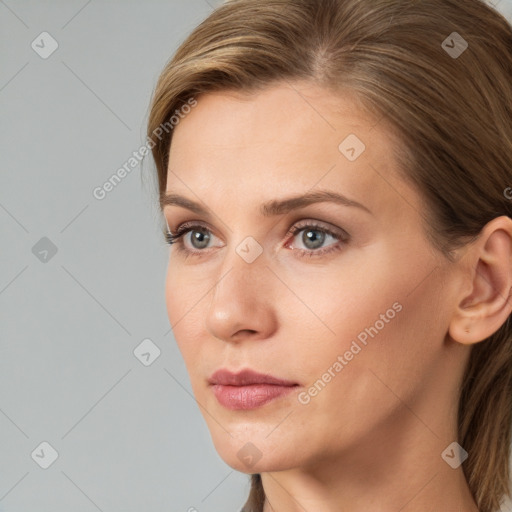 Neutral white young-adult female with long  brown hair and grey eyes