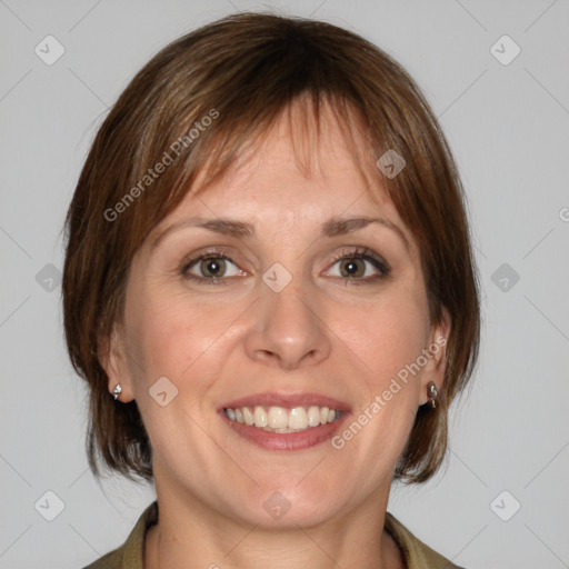 Joyful white adult female with medium  brown hair and grey eyes