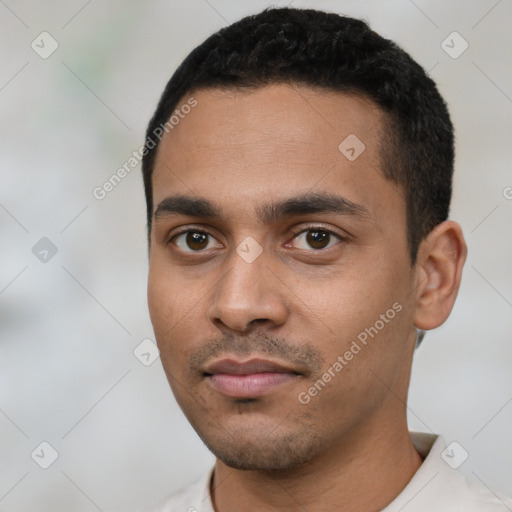 Neutral white young-adult male with short  black hair and brown eyes