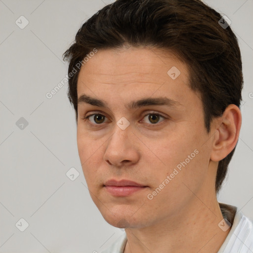 Neutral white adult male with short  brown hair and brown eyes