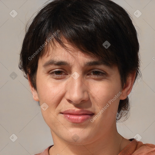 Joyful white adult female with medium  brown hair and brown eyes