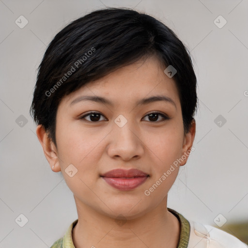 Joyful asian young-adult female with short  black hair and brown eyes