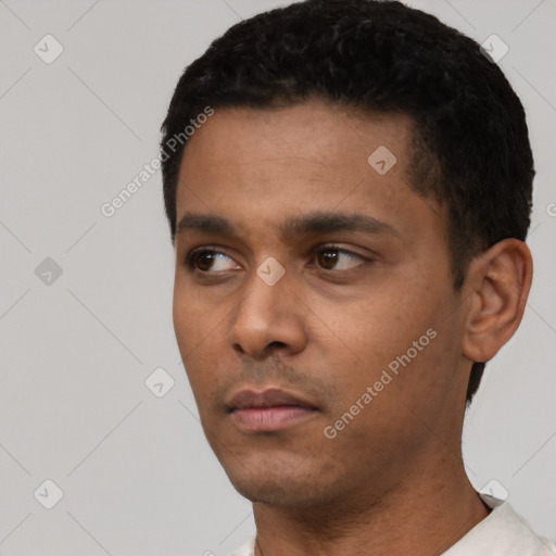 Neutral latino young-adult male with short  black hair and brown eyes