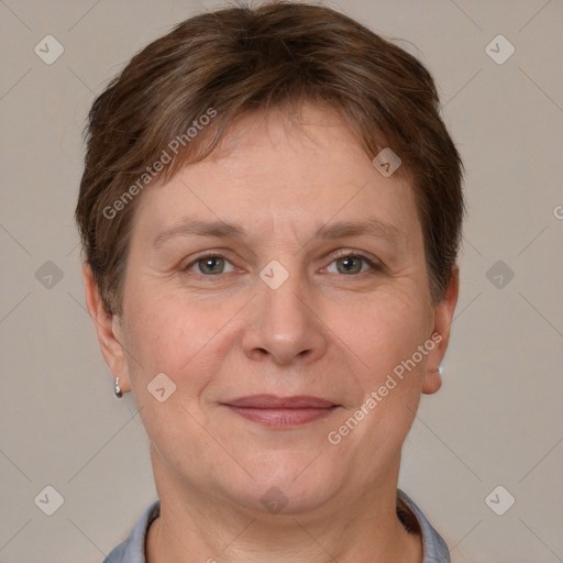 Joyful white adult female with short  brown hair and brown eyes