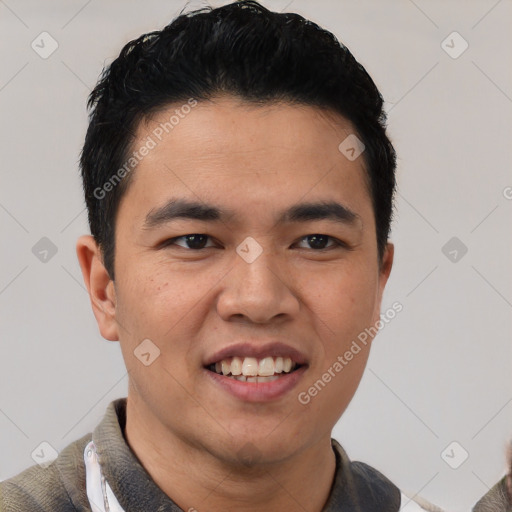 Joyful white young-adult male with short  black hair and brown eyes