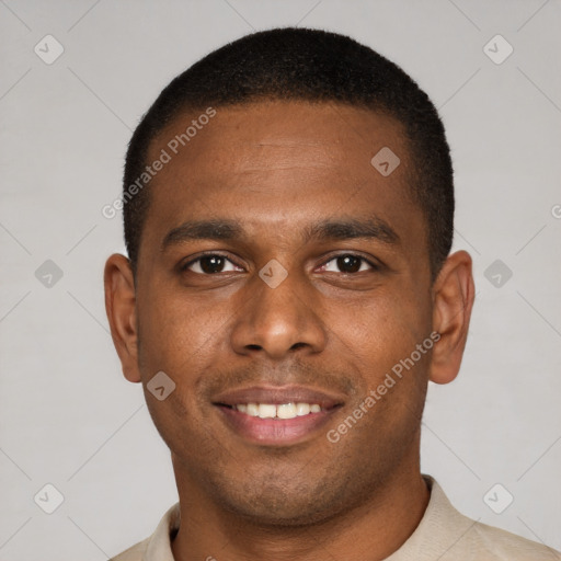 Joyful latino young-adult male with short  brown hair and brown eyes