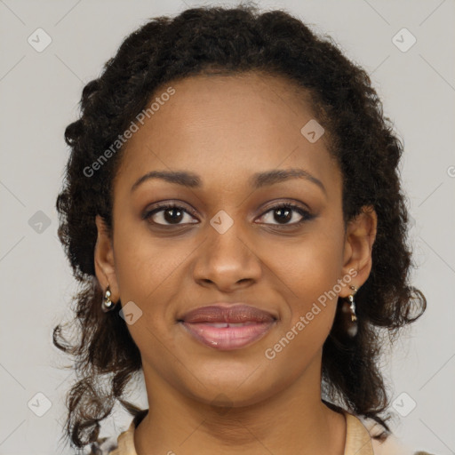 Joyful black young-adult female with long  brown hair and brown eyes