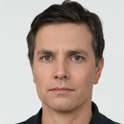 Neutral white adult male with short  black hair and brown eyes